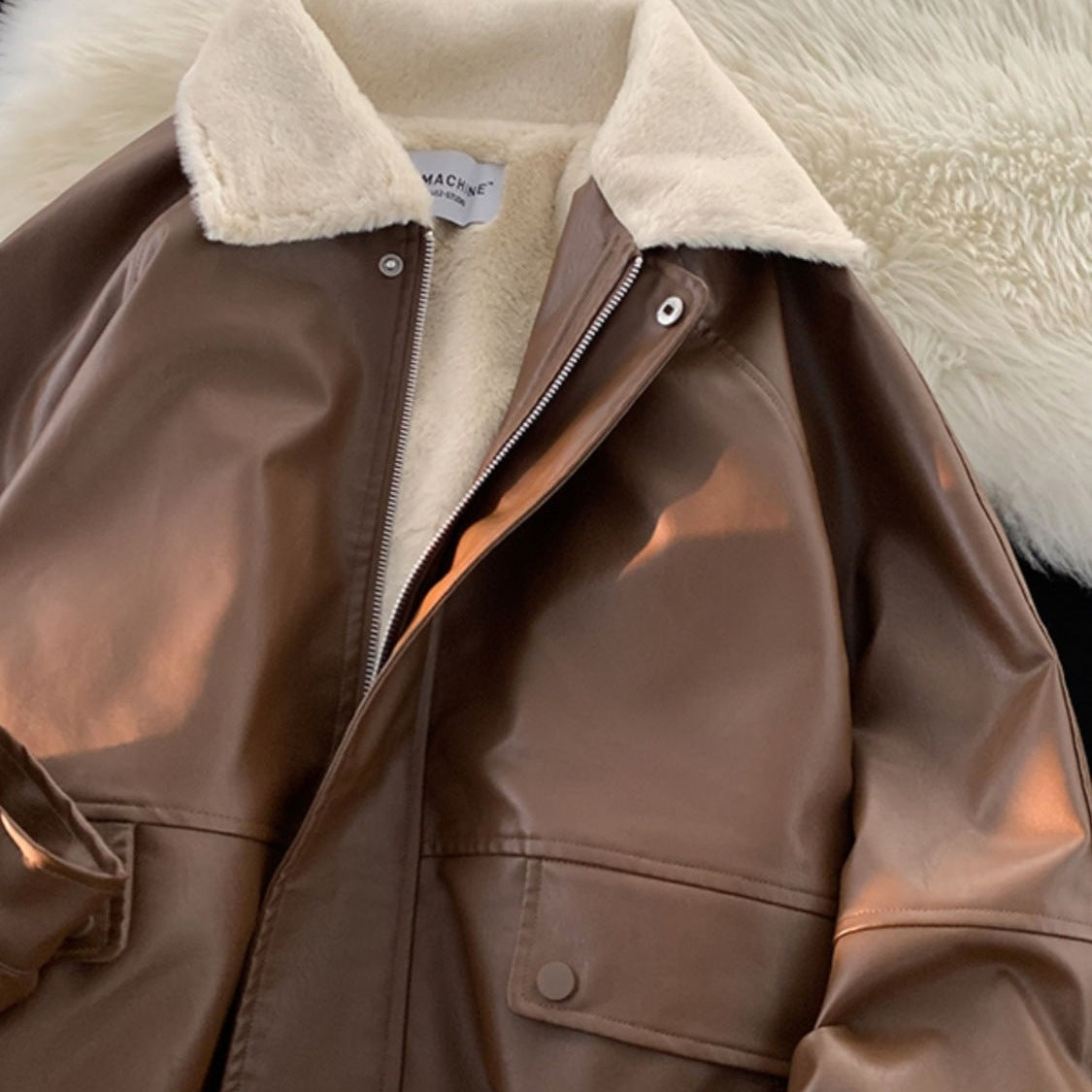 Leather jacket with lapel collar and pilot style