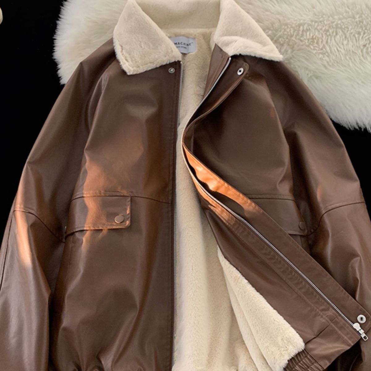 Leather jacket with lapel collar and pilot style